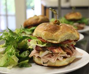 club sandwich with a side salad